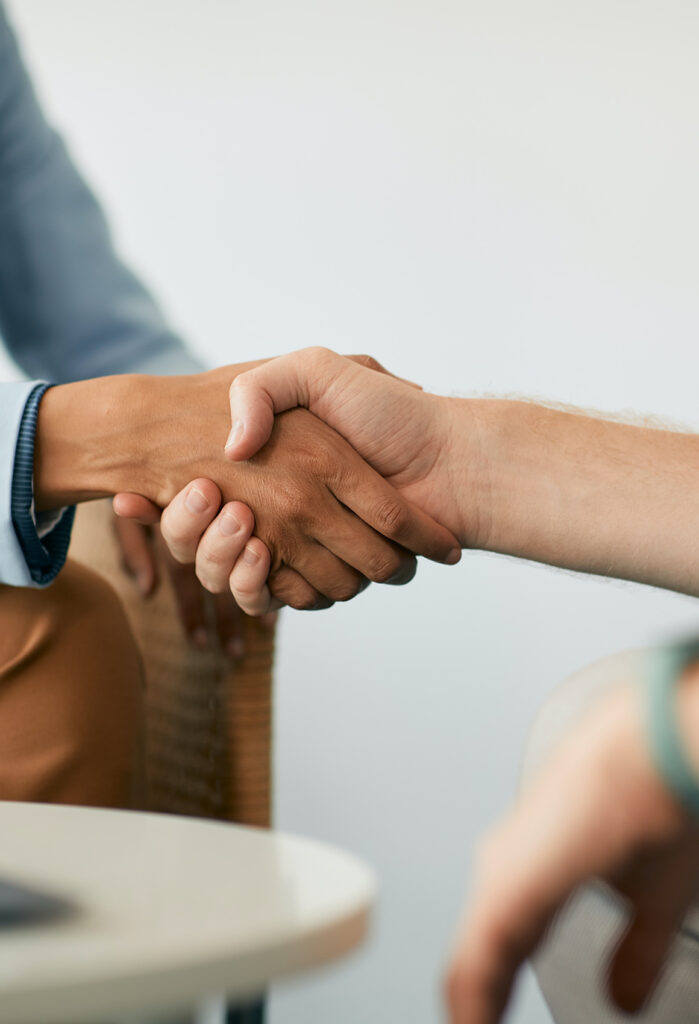 Two people shaking hands