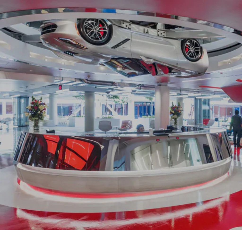 Upside-Down Car Suspended in Room